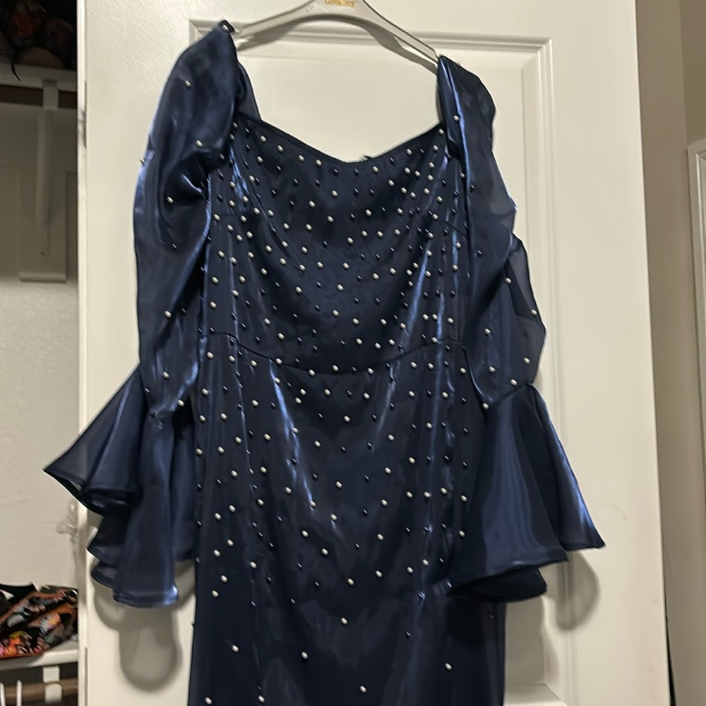 Long dark blue dress with pearls around it